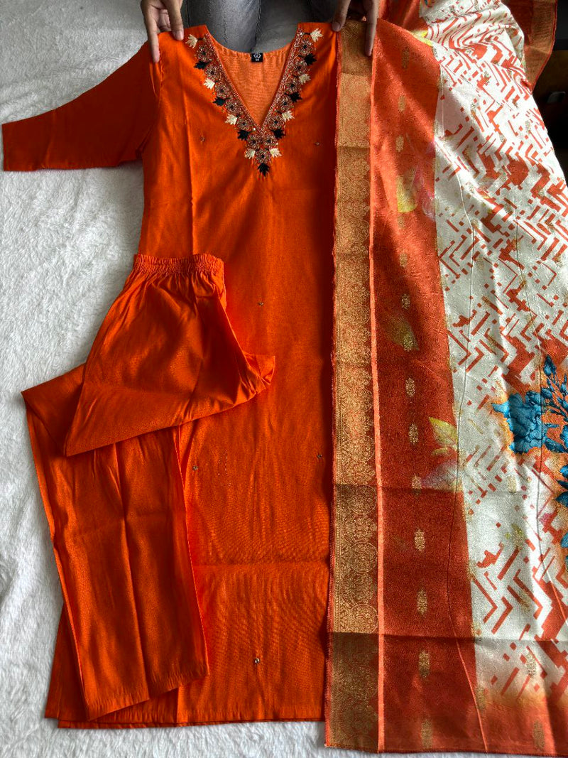 Orange Royale Roman Silk Suit – “SilkGlow Orange Edition” with Heavy Lichi Jacquard Dupatta & Hand Work